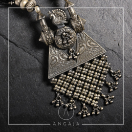 Silver pendant in black beads and silver beads necklace